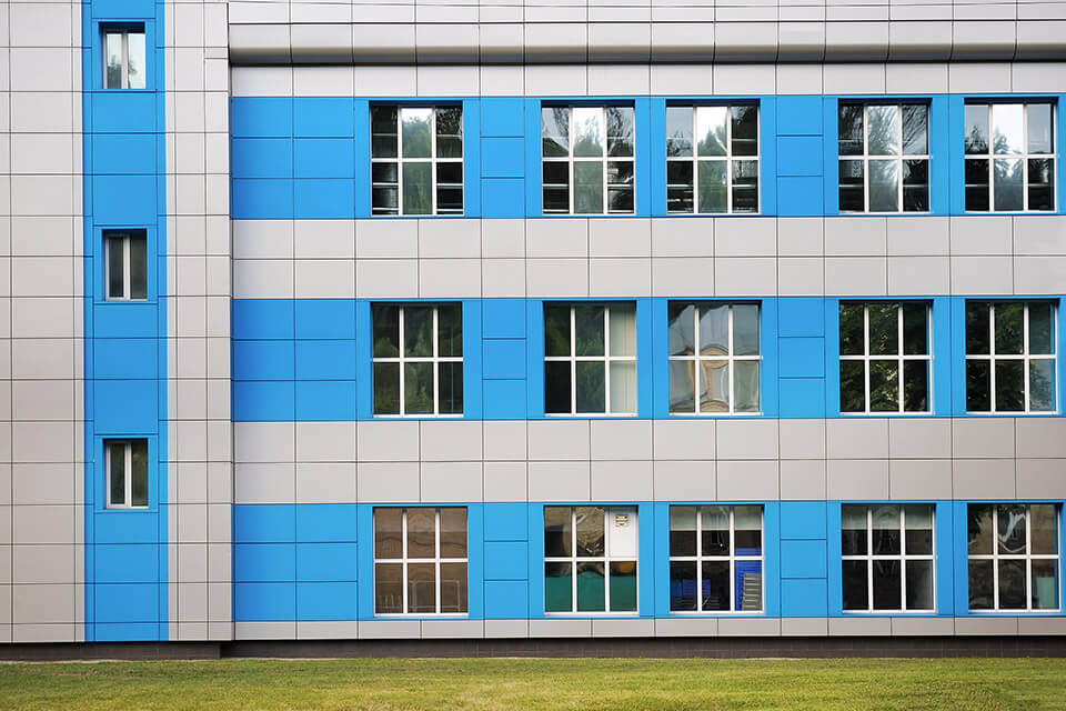 Office with blue and grey decorative panels