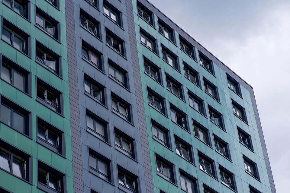 Office with green and black pressed cladding